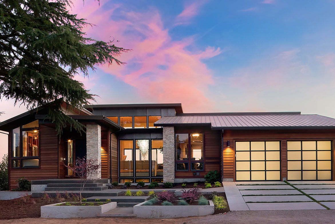 Gorgeous single level PNW home against a backdrop of cotton candy blue and pink sky